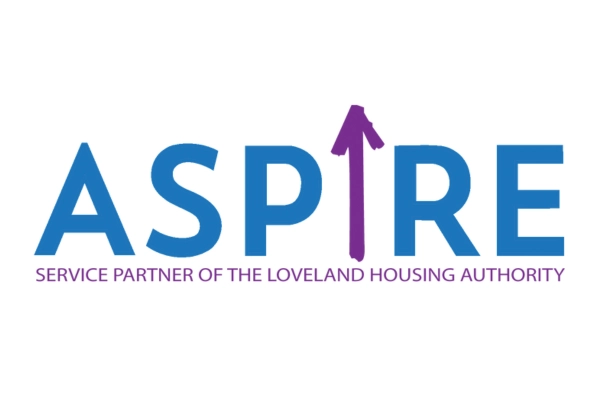 The image shows the logo of ASPIRE, a service partner of the Loveland Housing Authority. The text "ASPIRE" is in blue with a purple arrow forming the "I". Below it in purple text, it says "Service Partner of the Loveland Housing Authority.